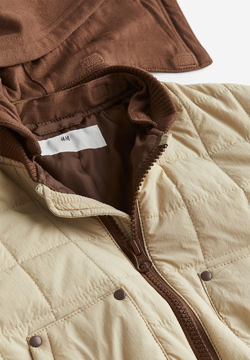 H&M - Quilted jacket with a hood - light beige block-coloured