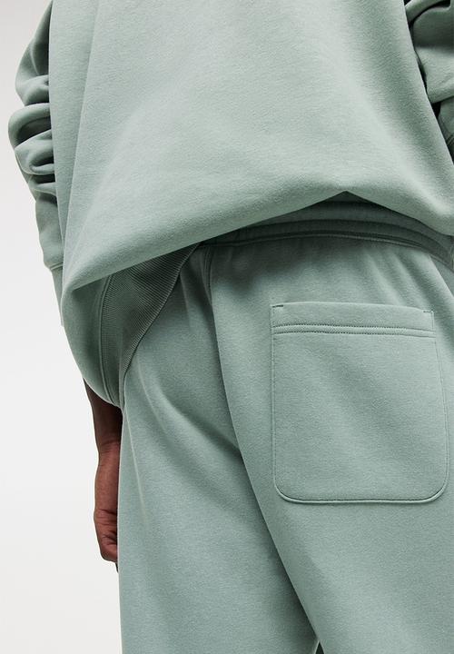 H&M - Relaxed fit sweatpants - light khaki green