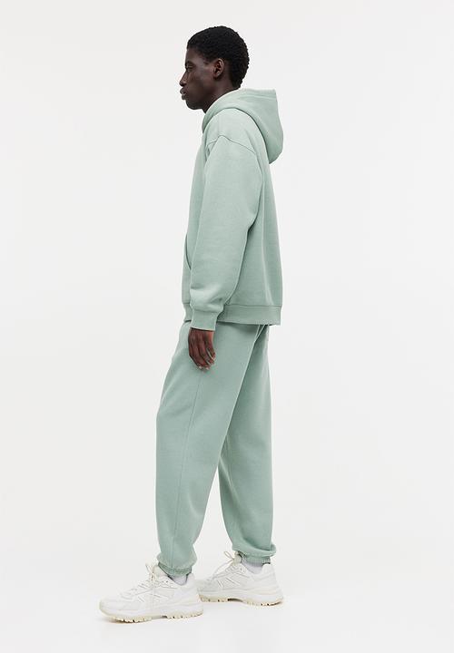 H&M - Relaxed fit sweatpants - light khaki green