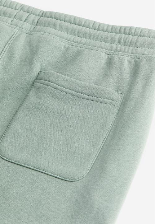 H&M - Relaxed fit sweatpants - light khaki green