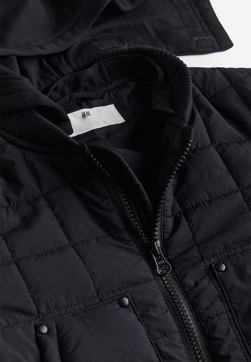 H&M - Quilted jacket with a hood - black