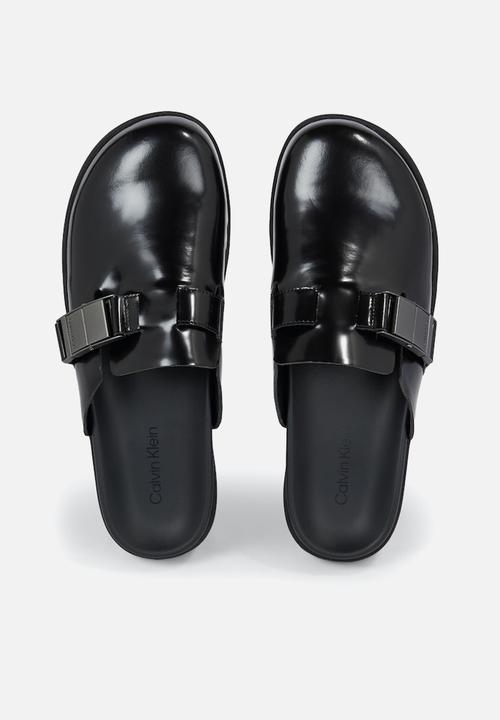 Calvin Klein - Mule w/ iconic plaque - black