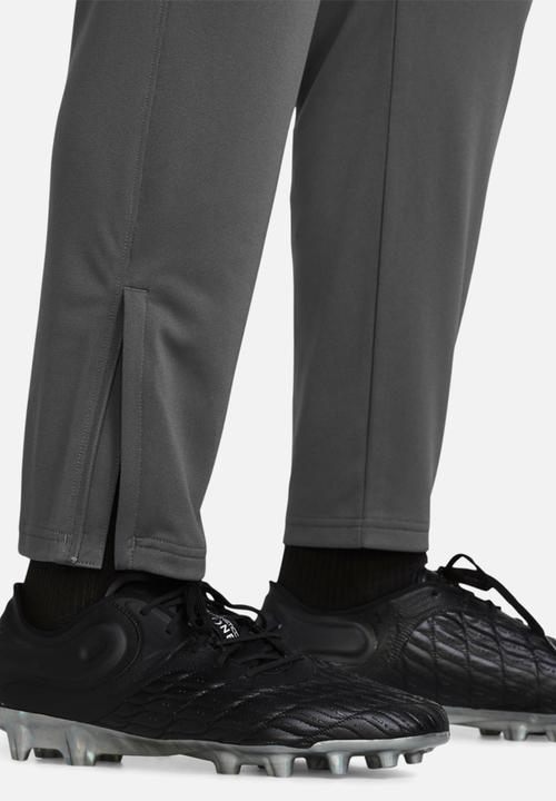 Under Armour - UA Challenger. pique pants - castlerock/white