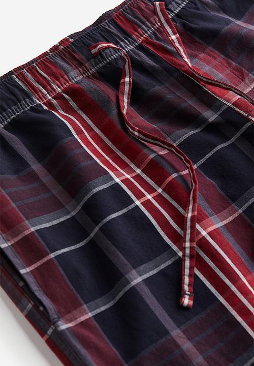 H&M - Relaxed fit pyjama bottoms - red/checked