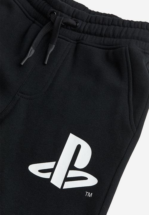 H&M - Printed joggers - black playstation