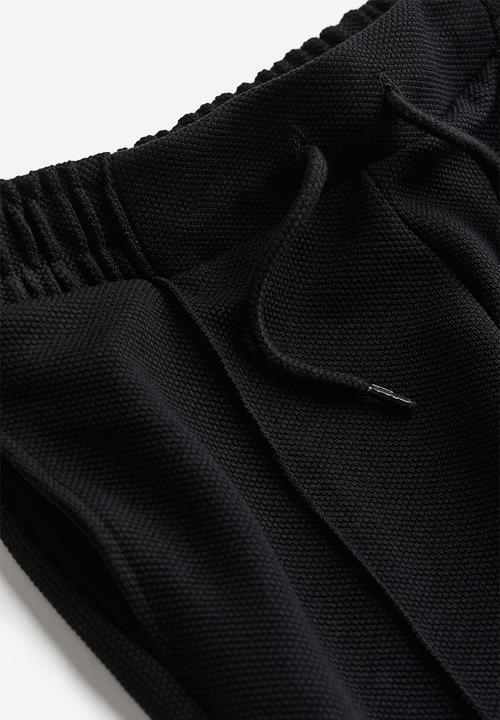 H&M - Dressy joggers - black