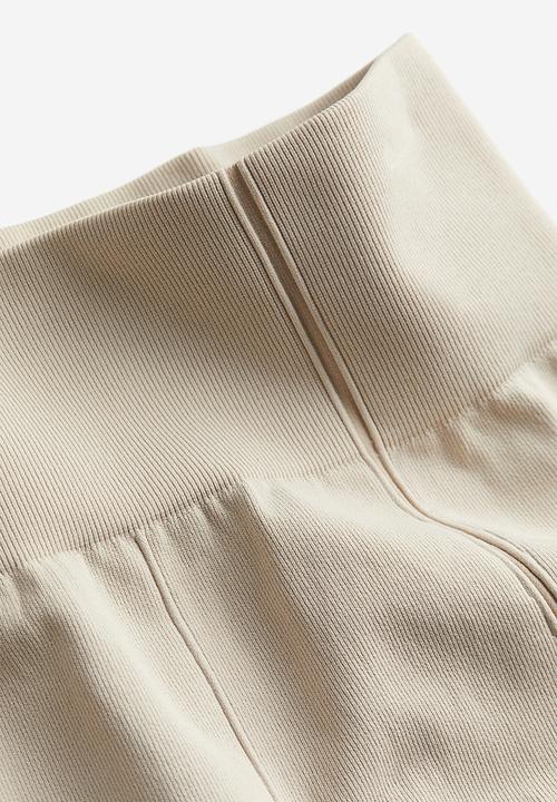 H&M - Drymove™ seamless sports tights - light beige