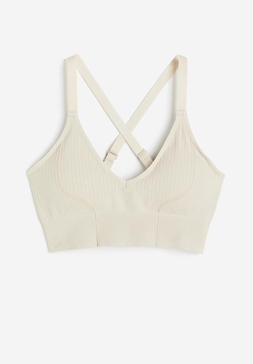 H&M - Drymove™ medium support sports bra - beige
