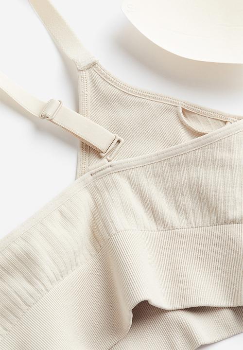 H&M - Drymove™ medium support sports bra - beige
