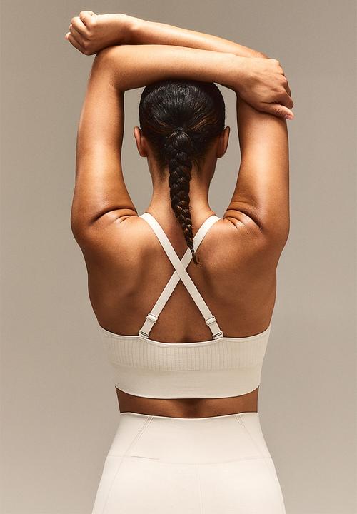 H&M - Drymove™ medium support sports bra - beige