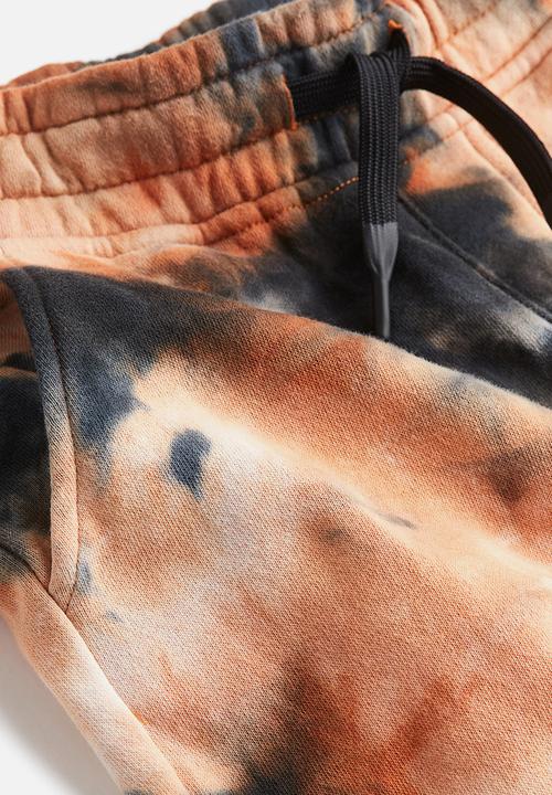 H&M - Printed joggers - orange & tie-dye