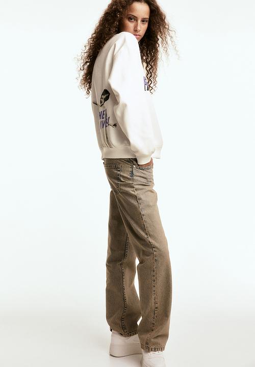 H&M - Printed sweatshirt - cream/universal monsters