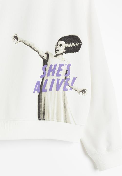 H&M - Printed sweatshirt - cream/universal monsters