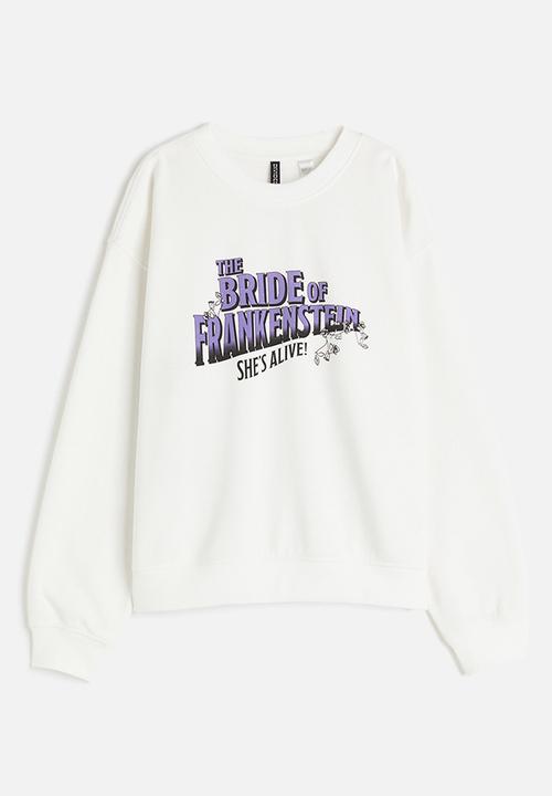 H&M - Printed sweatshirt - cream/universal monsters