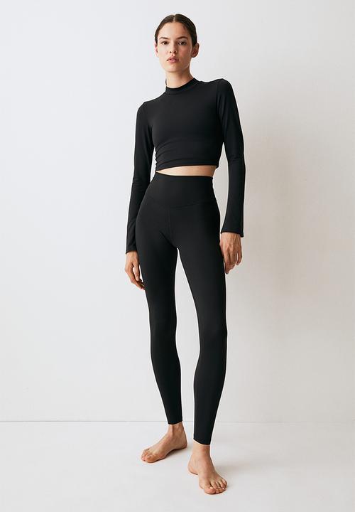 H&M - Softmove™ cropped sports top - black