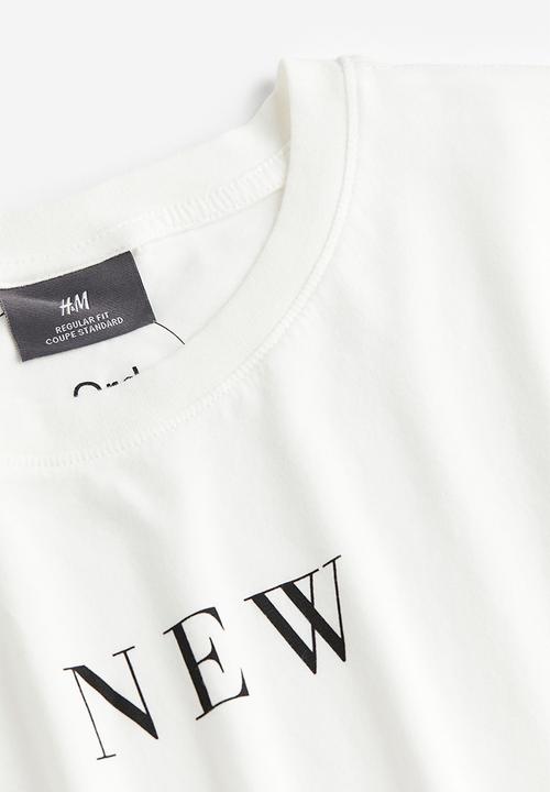 H&M - Regular fit printed t-shirt - cream/new order
