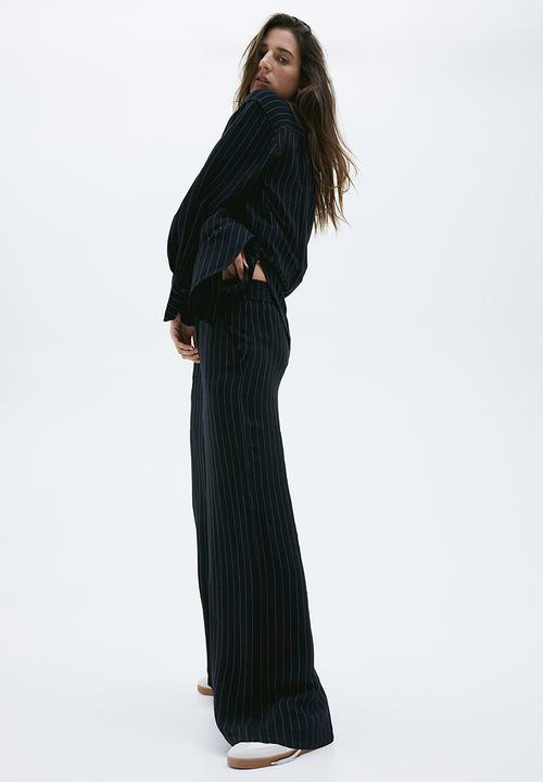 H&M - Pinstriped trousers - black/pinstriped