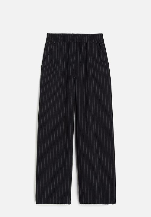 H&M - Pinstriped trousers - black/pinstriped
