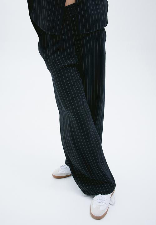 H&M - Pinstriped trousers - black/pinstriped