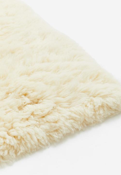 H&M - Tufted wool-blend rug - light beige 