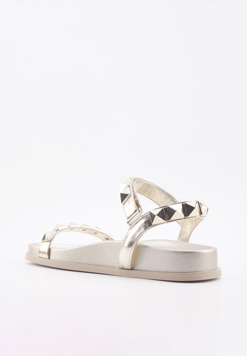 Nine West - Mild ankle strap studded sandal - gold