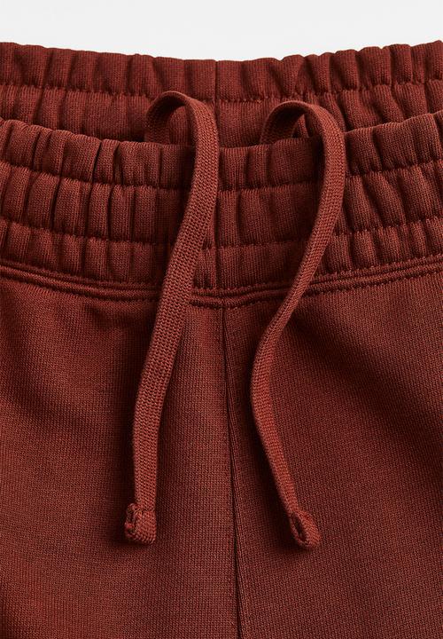 H&M - Relaxed fit cotton joggers - rust red