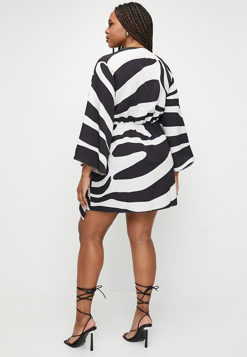 VELVET - Plus exaggerated sleeve mini wrap dress - graded zebra
