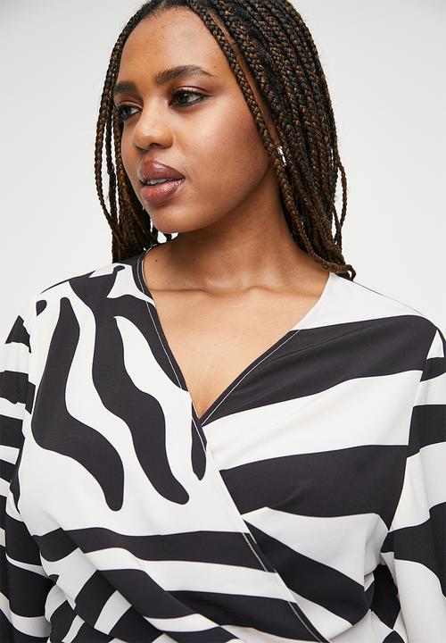 VELVET - Plus exaggerated sleeve mini wrap dress - graded zebra