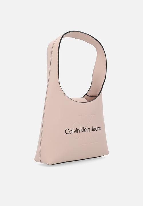Calvin Klein - Sculpted mini slim tote26 mono - Pale Conch