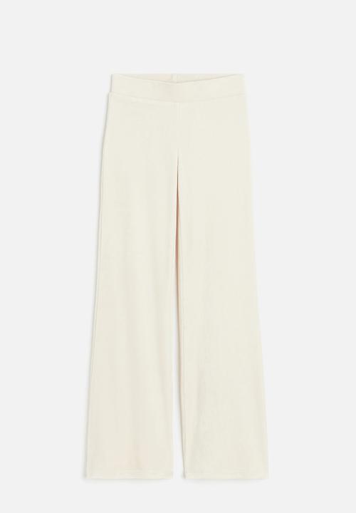 H&M - Flared velour trousers - white