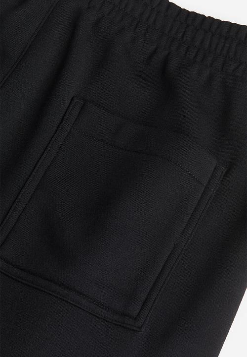 H&M - Slim fit cargo joggers - black