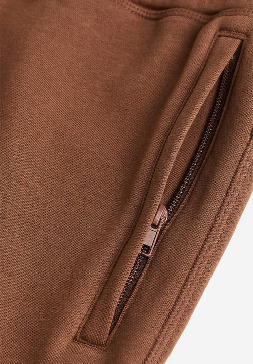 H&M - Thermolite® relaxed fit sweatpants - brown