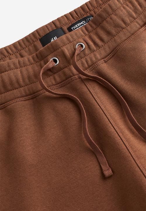 H&M - Thermolite® relaxed fit sweatpants - brown