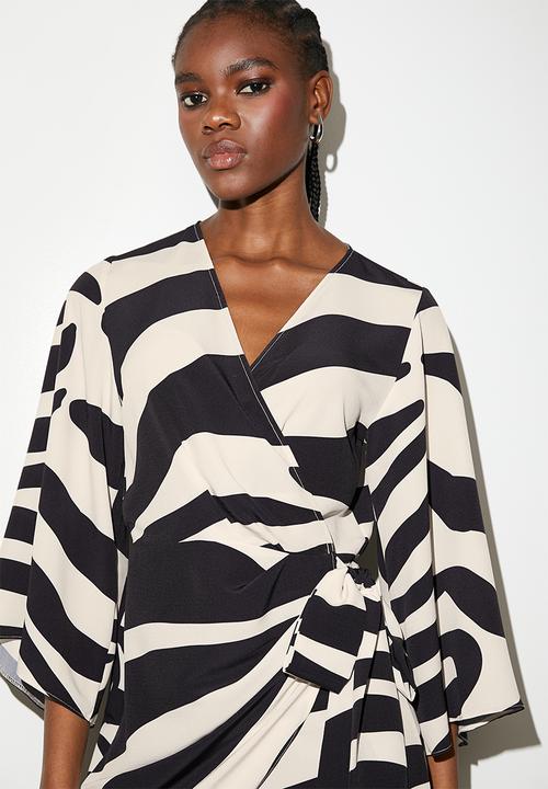 VELVET - Exaggerated sleeve mini wrap dress - graded zebra