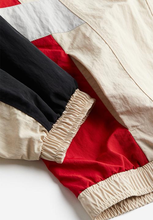 H&M - Nylon windbreaker - light beige block-coloured