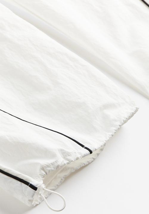 H&M - Piping-detail track pants - white, multi 