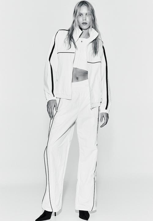 H&M - Piping-detail track pants - white, multi 