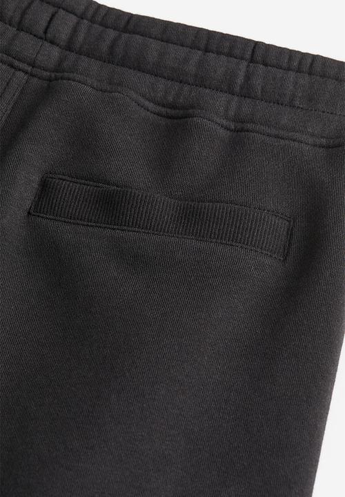 H&M - Printed joggers - black multi