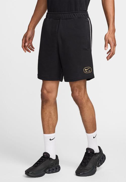 nike shorts gold and black