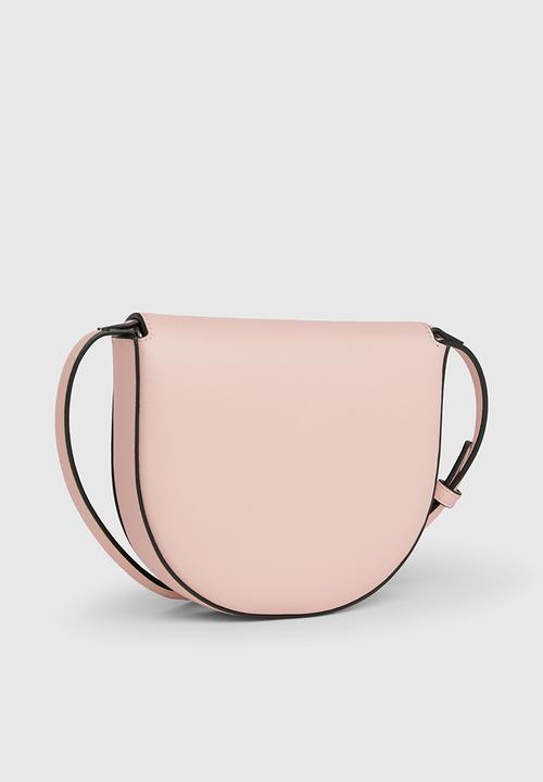 Calvin Klein - Sculpted mini saddle bag - pale conch