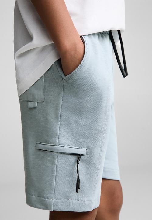 MANGO - Bermuda shorts day - light pastel blue