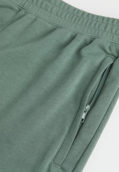 H&M - Coolmax® shorts - sage green