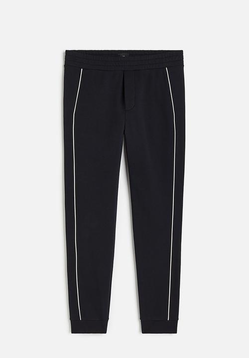 H&M - Slim fit joggers - black