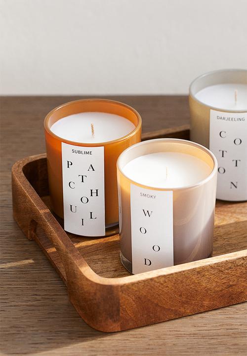 H&M - Scented candle in a glass holder - dark mustard yellow