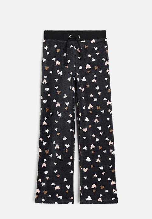 H&M - Velour trousers - black hearts