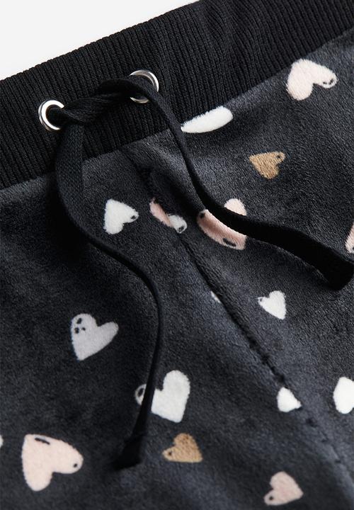 H&M - Velour trousers - black hearts