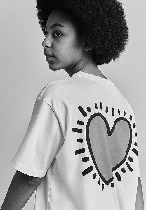 H&M - Oversized printed t-shirt - white & keith haring 