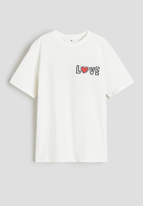 H&M - Oversized printed t-shirt - white & keith haring 