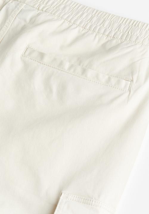 H&M - Relaxed fit cotton cargo joggers - cream 