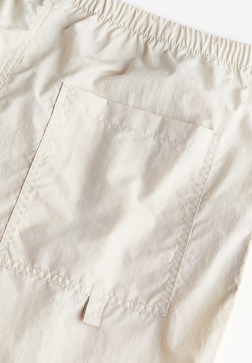 H&M - Nylon parachute trousers - light beige